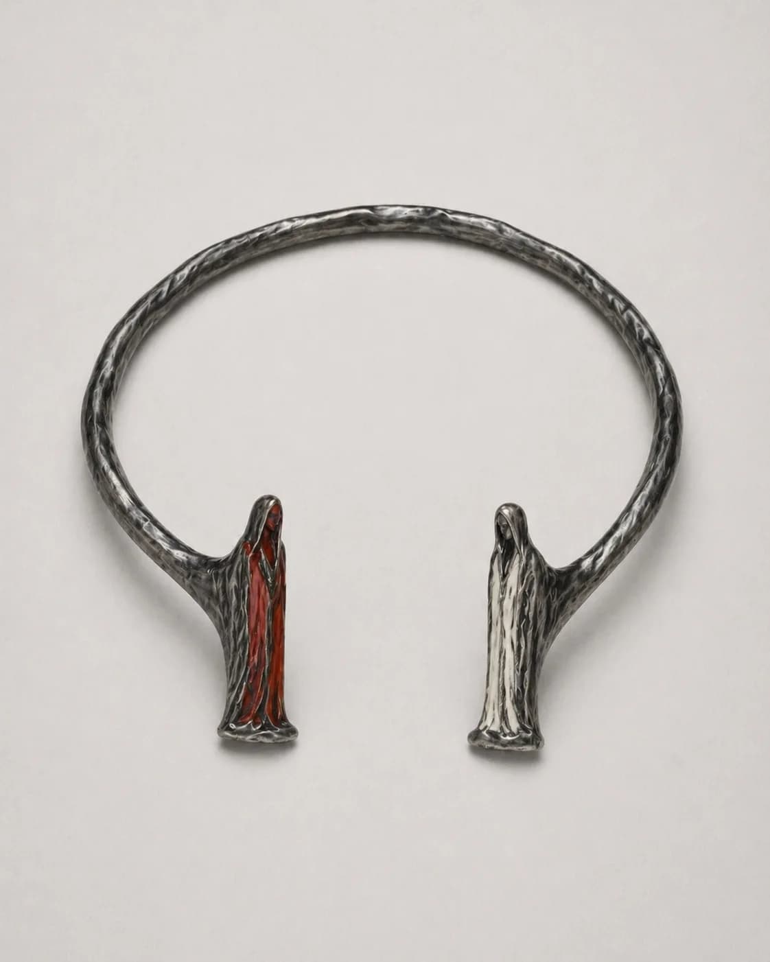 Cantica I open torque bracelet with two figures